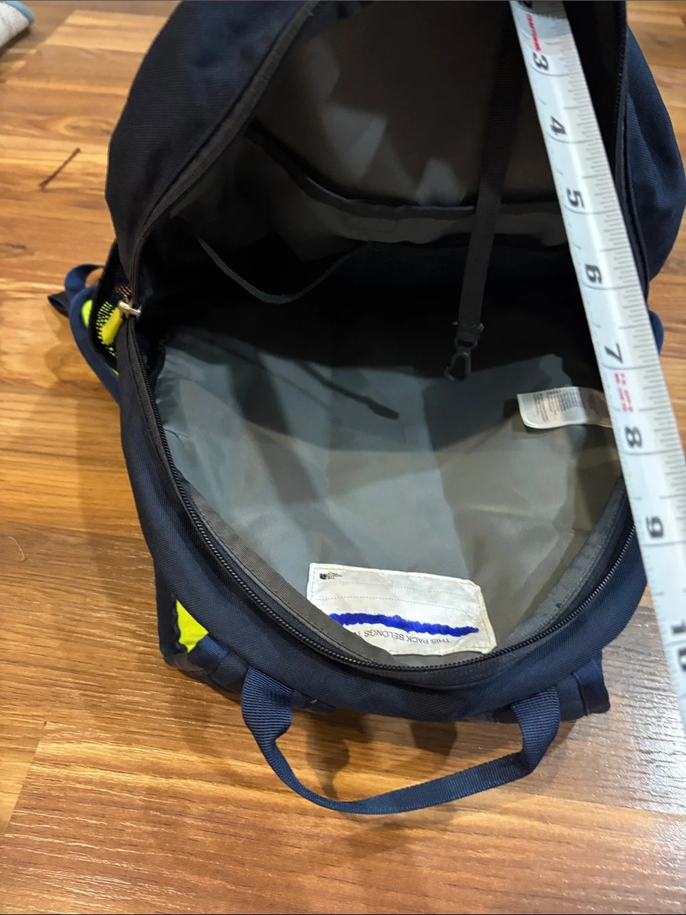 The North Face Black Backpack with Neon Green Lightning Print